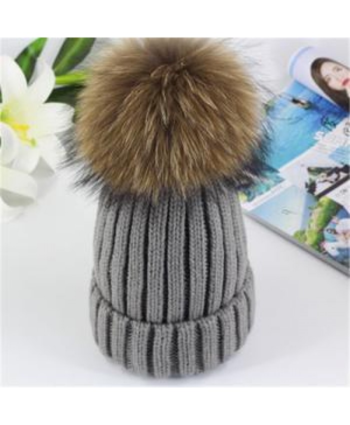 Winter 2020 new wholesale ladies really big raccoon fur ball thick striped wool hat parent-child outdoor leisure knitted hat